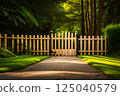 Sunlit Wooden Gate Opening to Enchanting Green Forest Pathway 125040579