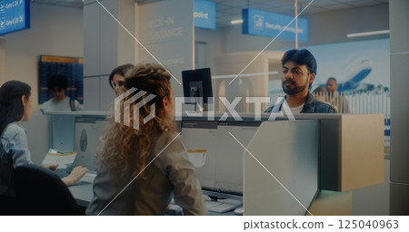 Multiethnic Passengers at Check-in Counter in International Airport Terminal 125040963