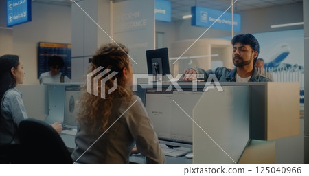 Multiethnic Passengers at Check-in Counter in International Airport Terminal 125040966