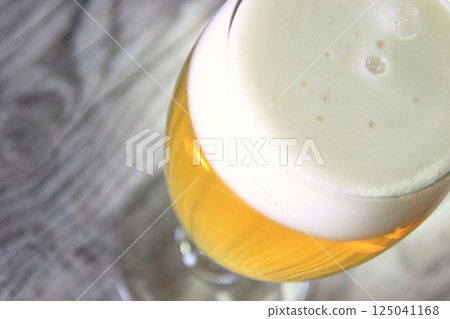 Beer 15 Beer poured into a glass Beer 15 Beer poured into a glass 125041168