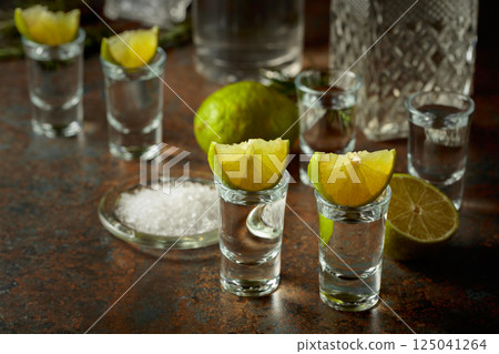 Mexican tequila with lime and sea salt. Mexican tequila with lime and sea salt. 125041264