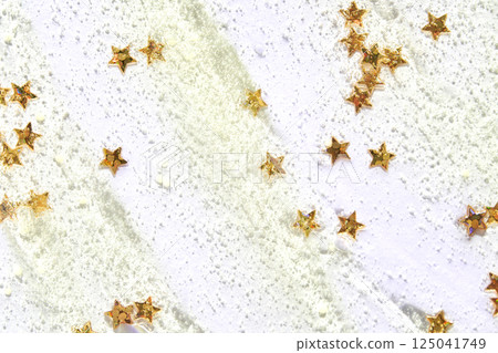 Gold star confetti scattered on white glitter background sparkle celebration Gold star confetti scattered on white glitter background sparkle celebration 125041749