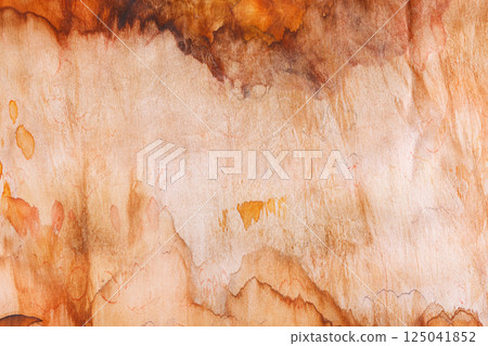 abstract pattern on silk fabric texture in yellow and brown tones 125041852