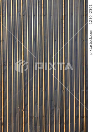 Metal Sheet, Galvanized Iron plate, gray corrugated metal cladding use as wall. 125042591