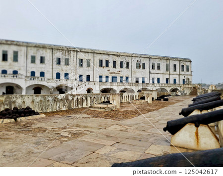 Elmina Castle Accra Ghana buildings and cannons 125042617
