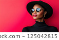 Beauty stylish portrait of fashion young African woman in hat, beautiful trendy model 125042815