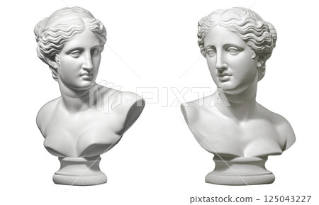 A statue of a womans head is displayed from two unique angles 125043227