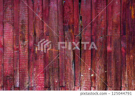 Weathered red wooden planks texture 125044791