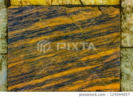Worn Marble Floor Tile with Diagonal Gold and Dark Veins 125044857