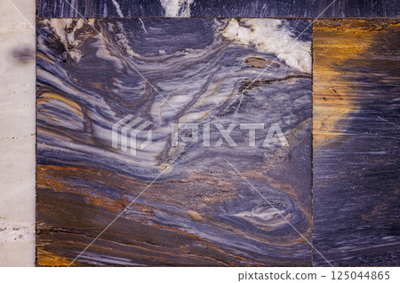 Worn Layered Blue, Brown, and White Marble Floor Tile Worn Layered Blue, Brown, and White Marble Floor Tile 125044865