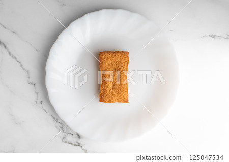 Baked goods and space on a white plate④ Baked goods and space on a white plate④ 125047534