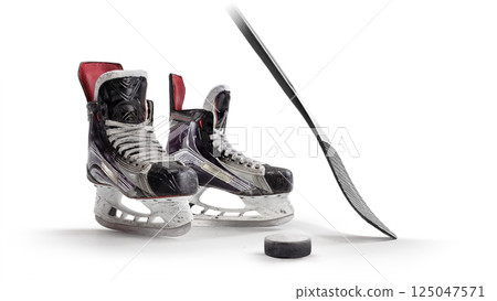 Hockey. Hockey skates, stick and puck close-up. Side view. Professional equipment in white background. Sport. Hockey equipment 125047571