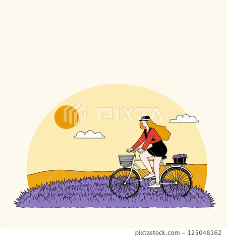 Woman Cycling Through Lavender Field 125048162