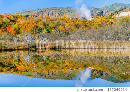 Iwate - Hachimantai covered in autumn leaves - Akanuma Pond, a water mirror 125049914