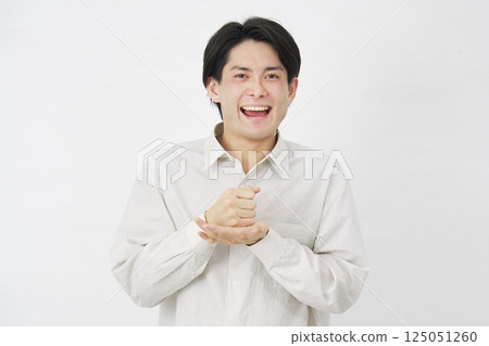 Man in his 20s, inspiration, white background Man in his 20s, inspiration, white background 125051260