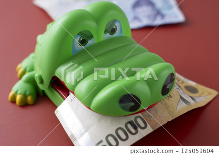 Korean Money Won and Crocodile 125051604