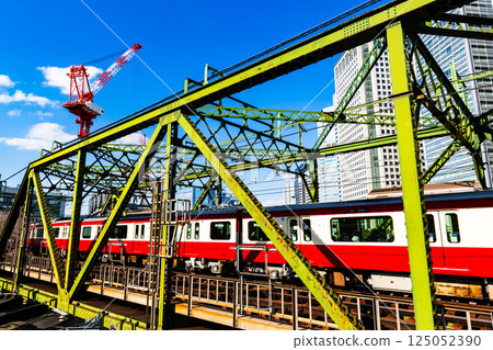 Railway bridge and construction crane Tokyo railway scene 2025.03 a-2 High saturation contrast 125052390