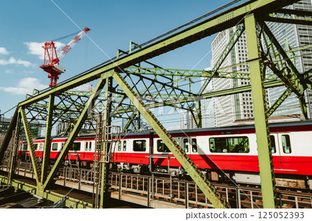 Railway bridge and construction crane Tokyo railway scene 2025.03 a-5 film style 125052393