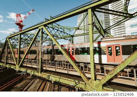 Railway bridge and construction crane Tokyo railway scene 2025.03 b-5 film style 125052406