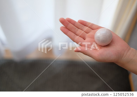 Tape ball and elementary school student's hand Tape ball and elementary school student's hand 125052536