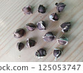Moringa seeds (from Mexico) on a wooden cutting board 125053747