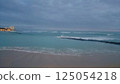 Hawaii: Cloudy beach and raging waves 125054218