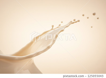 Instantaneous photography of cream-colored liquid 125055043