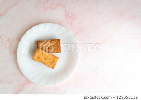 White plate, baked goods and cherry blossom background③ 125055119