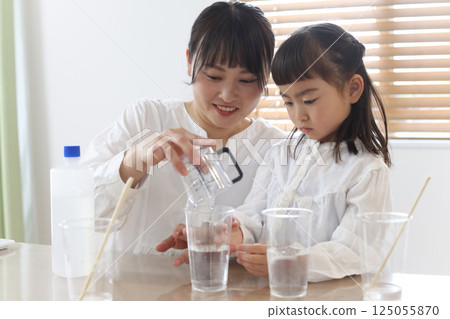 Parent and child making slime Parent and child making slime 125055870