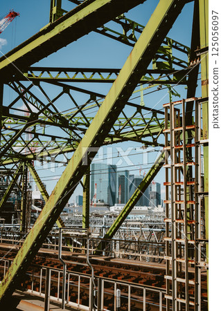 Railway bridge and skyscrapers Tokyo cityscape 2025.03 b-5 film style 125056097