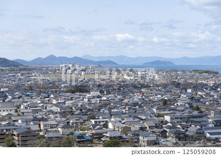 View of Hikone city and Lake Biwa from Hikone Castle View of Hikone city and Lake Biwa from Hikone Castle 125059208