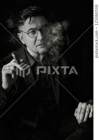 Monochromatic portrait of a serious man Monochromatic portrait of a serious man 125060588