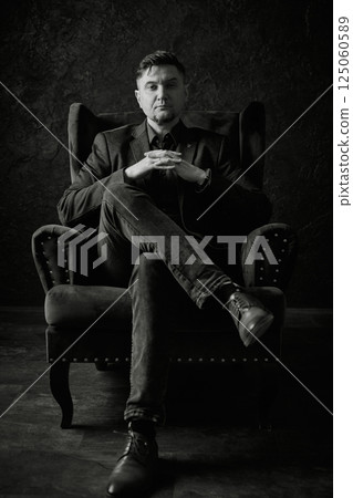 Monochromatic portrait of a serious man 125060589