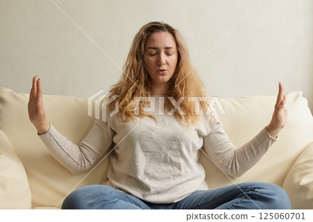 Middle aged woman sit in yoga 125060701