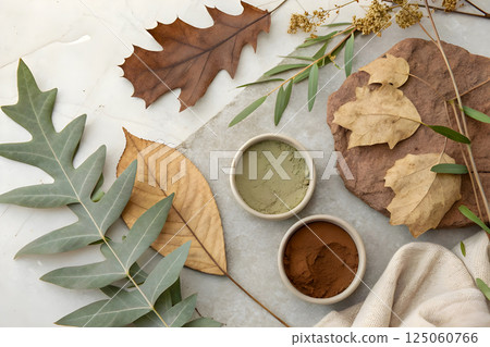 cup of hot coffee with autumn leaves 125060766