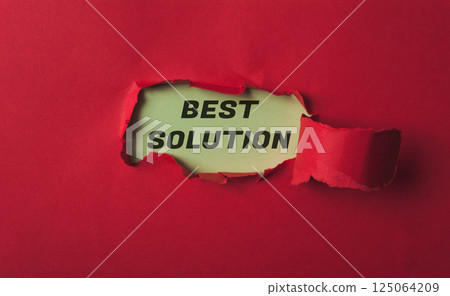 Red paper with the word best solution written on it 125064209