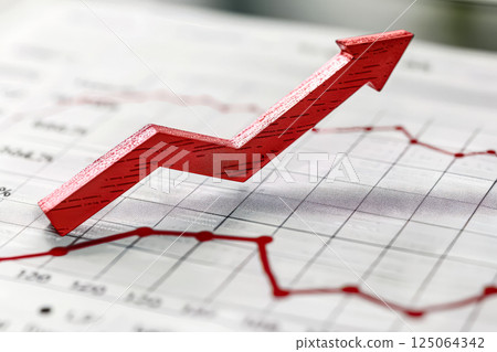 Red arrow is on top of a graph with red lines Red arrow is on top of a graph with red lines 125064342
