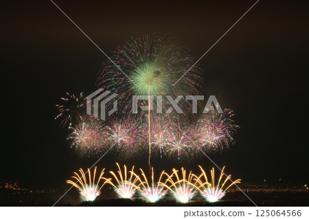 Fireworks color the night sky in early summer 125064566