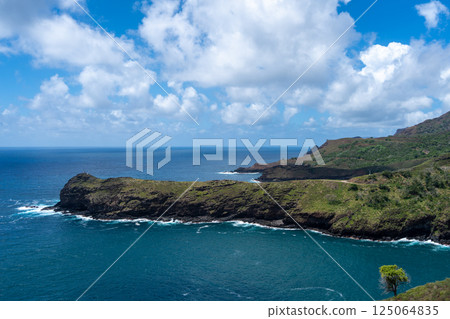 Coastal cliffs and turquoise bay near Puamau, Hiva Oa, Marquesas Islands, French Polynesia Coastal cliffs and turquoise bay near Puamau, Hiva Oa, Marquesas Islands, French Polynesia 125064835