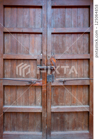 Wooden door close-up view with rusty Wooden door close-up view with rusty 125064858