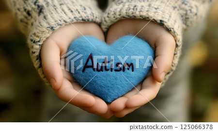 World Autism Awareness Day, blue heart World Autism Awareness Day, blue heart 125066378