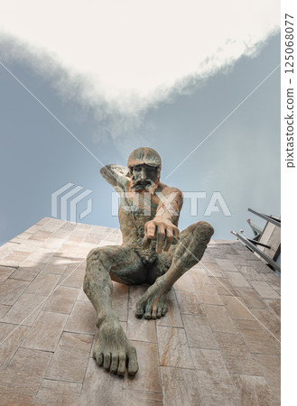 Look up at River God Tyne sculpture is mounted on an external wall of The Newcastle Civic Centre Building. Look up at River God Tyne sculpture is mounted on an external wall of The Newcastle Civic Centre Building. 125068077