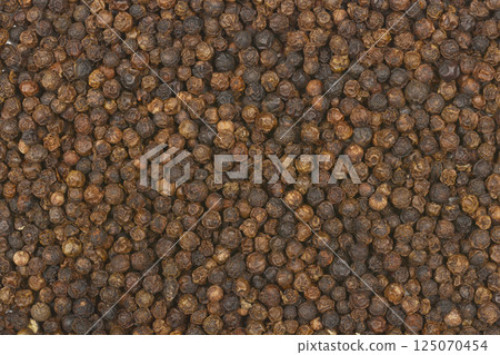 Dried black peppercorns Dried black peppercorns 125070454