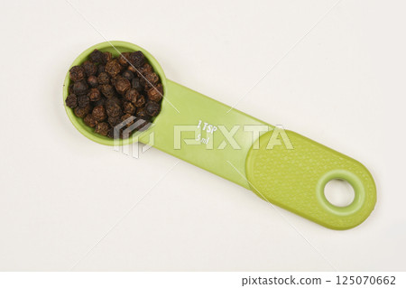 Dried black peppercorns Dried black peppercorns 125070662