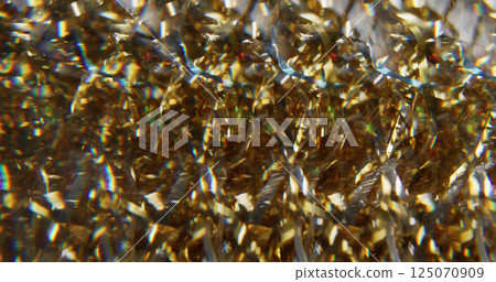 Blur magic glowing. Radiance glistening. Golden yellow green red color lens flare gleaming flickers on art abstract bokeh light background. 125070909