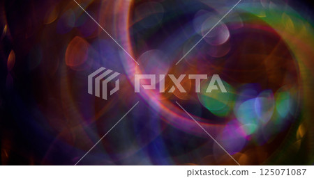 Fluorescent circles. Defocused glittery sparkle. Colorful gleaming bright particles lens flare motion on abstract blurred modern background. Fluorescent circles. Defocused glittery sparkle. Colorful gleaming bright particles lens flare motion on abstract blurred modern background. 125071087