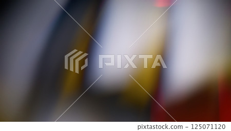 Laser effect. Blur glow. Defocused white yellow crimson color lens flare shine sparks on abstract dark black background. Laser effect. Blur glow. Defocused white yellow crimson color lens flare shine sparks on abstract dark black background. 125071120