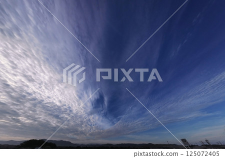 A refreshing morning in the southern sky with a variety of clouds spreading out radially, ultra-wide-angle, sky-focused, 240718am 125072405