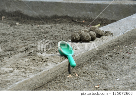 Shovel in the sandbox at the park_01 Shovel in the sandbox at the park_01 125072603