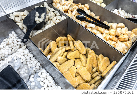 Frozen semi-finished products in a grocery store. A good natural product for fast cooking delicious food 125075161